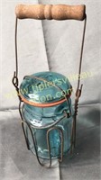 Blue jar in wire rack