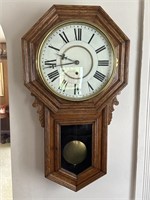 Wall clock with key