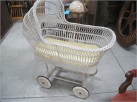 lg. wicker baby bed on wheels