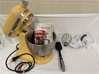 Small yellow Kitchen Aid Mixerand four attachments