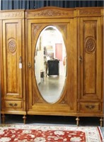 European 19th c. 3 Door Wardrobe with oval mirror