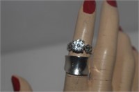 Two Sterling Silver Rings. One w/ White Stones