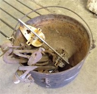 Cast iron gypsy pot, old ice skates
