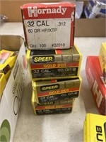Three boxes of 32 caliber bullets, one box 270,