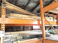 Lot of various sized lumber, both shelves