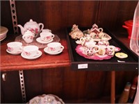 Three doll tea sets, two are figural, all