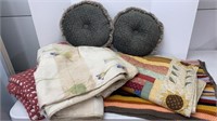 Round pillows, afghans and throw