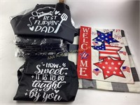 Aprons (22) assorted sayings.  Decorative flag.