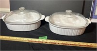 Two large covered dishes