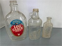 3 vintage bottles . Log Cabin Syrup