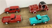 4 toy trucks