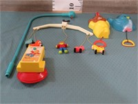 3 VINTAGE FISHER - PRICE CRIB TOYS