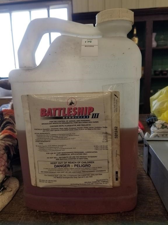 1/2 full  2.5 gal of Battleship Herbicide