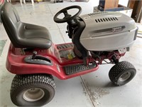 White Outdoor Riding Lawn Mower