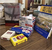 LOTS OF PLAYING CARDS AND BOOKS