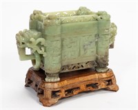 CHINESE, CARVED JADE LIDDED LION BOX ON STAND