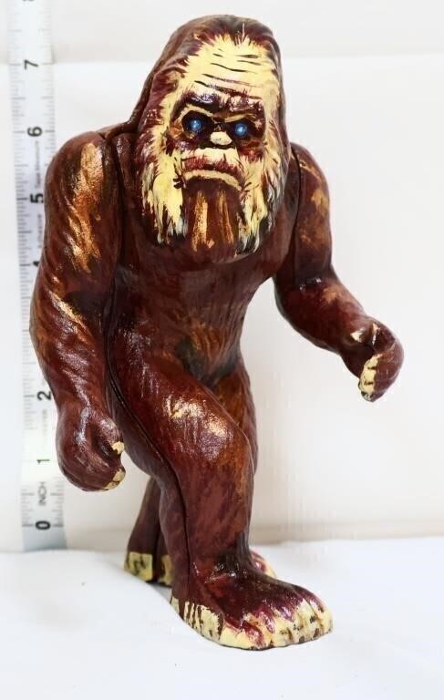 Cast iron walking Bigfoot bank