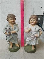 Pair of ceramic children statues
