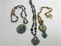 THREE JADE AND NATURAL STONE NECKLACES