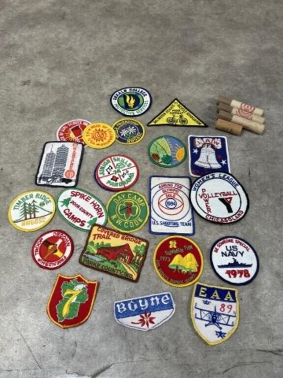 Assortment of patches and Daisy pellet gun