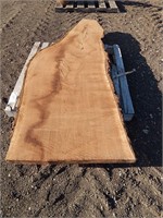 Live edge walnut slab; 85" long; 2 1/2" thick