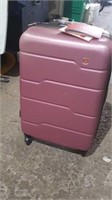 Pink 24" hard sided spinner suitcase