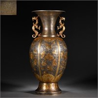 A CHINESE BRONZE PARTLY GILT VASE