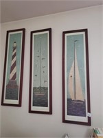 Three Nautical Pictures and Sign Above the Door