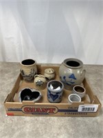 Assortment of pottery pieces, some marked Rowe