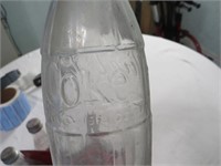 Six Screw-On Cap Coca Cola Bottles in Coca Cola
