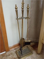 Beautiful brass colored fireplace tools