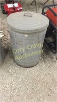 Metal trash can with lid 21” wide 28” tall