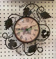 Wine themed wall clock. Untested. Has a 13 inch
