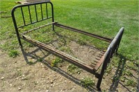 48" ANTIQUE METAL BED ON ROLLERS