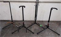 4 Black Guitar Stands- 2 Fret Rest, 1 First Act,