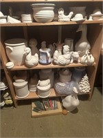 3 shelves of ceramic pieces including ducks &