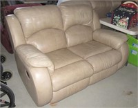 Leather reclining loveseat.  Measures 63" long.