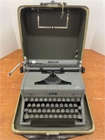 Vintage Royal Quiet De Luxe Portable Typewriter.