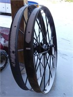 TWO 48" STEEL IMPLEMENT WHEELS