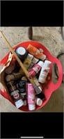 basket of acrylic paint and paint brush