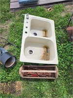 Kitchen sink and toolbox of tools