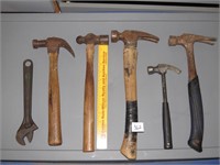 Group of Hammers and an adjustable Wrench -