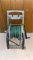 Hose on reel. Used but good working condition