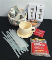 Assorted glue sticks, plastic beads, tea lights,