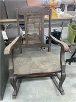 Antique cane backed rocking chair