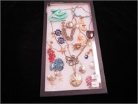 Tray of costume jewelry, mostly figural,