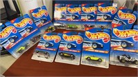 12 Hot wheels New on card. This lot includes 1-4