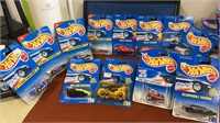 12 Hot wheels new on card. This lot includes 1-4