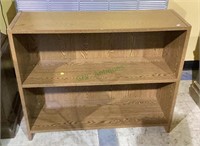 Two shelf wooden book case with one adjustable
