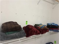 Asst Sizes of Blankets on Wire Shelf